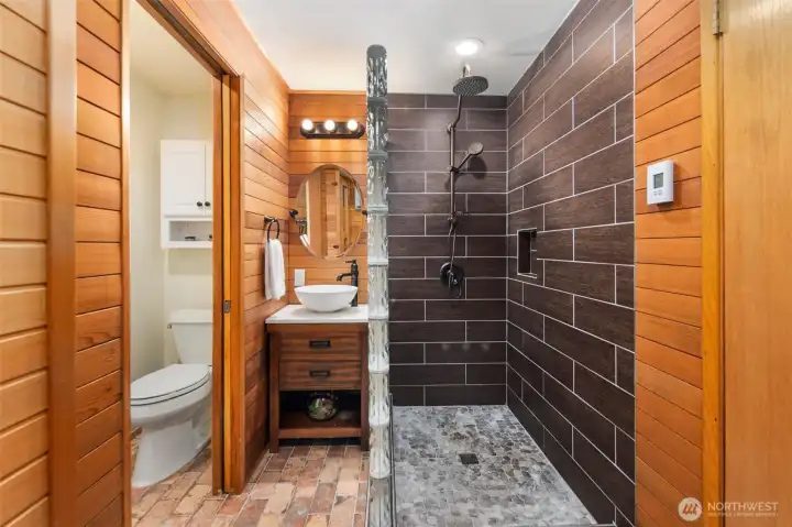 And heated floors with a river rock shower.
