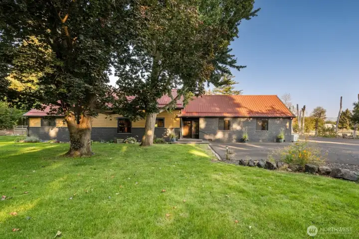 Private setting with asphalt driveway