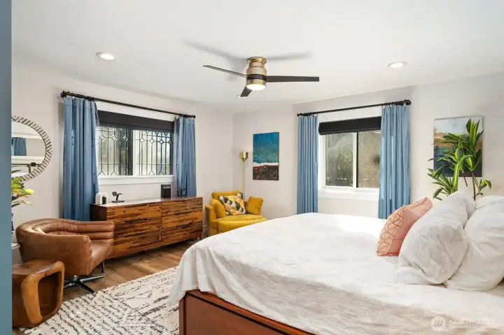 Primary suite with natural light and beveled glass