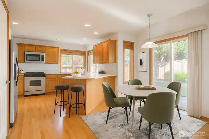 Dinning area off of kitchen with access to the back yard. virtually staged