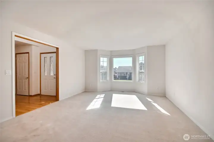 Living room with tons of natural lighting.