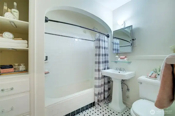 Spacious bath with wonderful tile work.