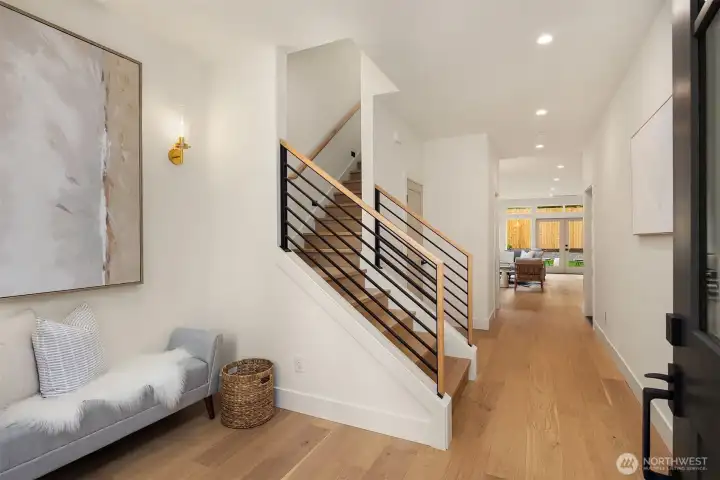 Welcoming entryway with plenty of room for a drop zone or bench