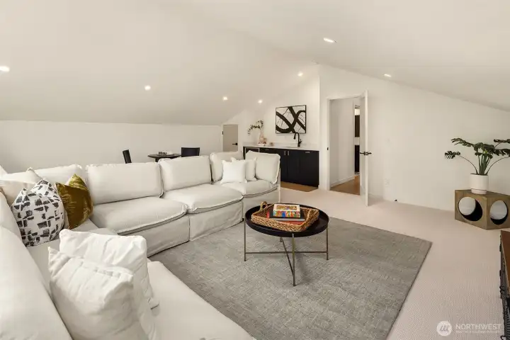 Upstairs rec room complete with wet bar and beverage center