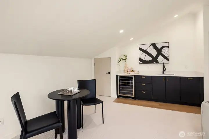 Upstairs rec room complete with wet bar and beverage center