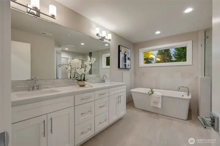 Step into your private, spa-inspired en-suite, where serene design meets indulgent luxury. Dual sinks, gleaming quartz countertops, and thoughtful finishes create a retreat that transforms everyday routines into moments of relaxation and rejuvenation.