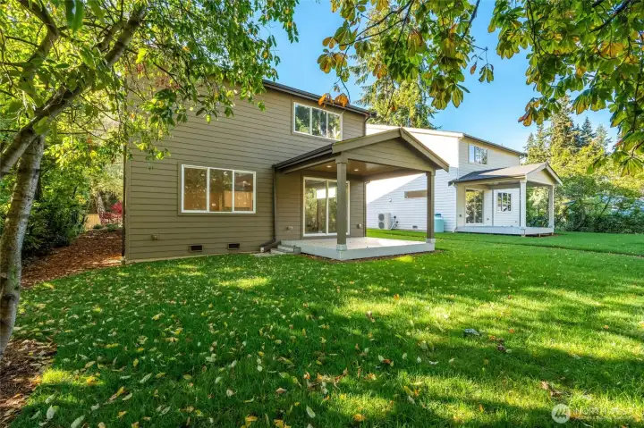 Designed for both function and leisure, the covered back deck provides ample space for dining, lounging, or simply savoring peaceful outdoor living.