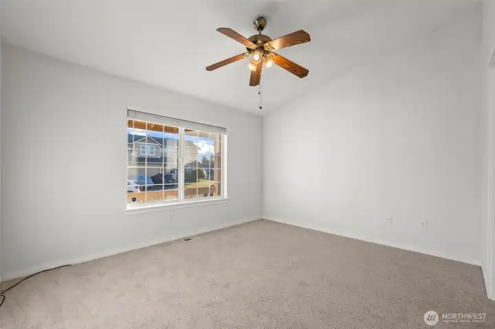 Primary En-Suite with window that faces the street. Brand new carpet and fresh paint.