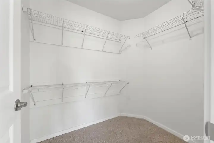 walk-in closet in primary en-suite, brand new carpet