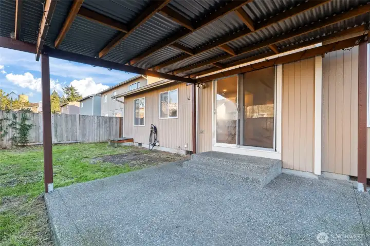 covered patio with slider into the house