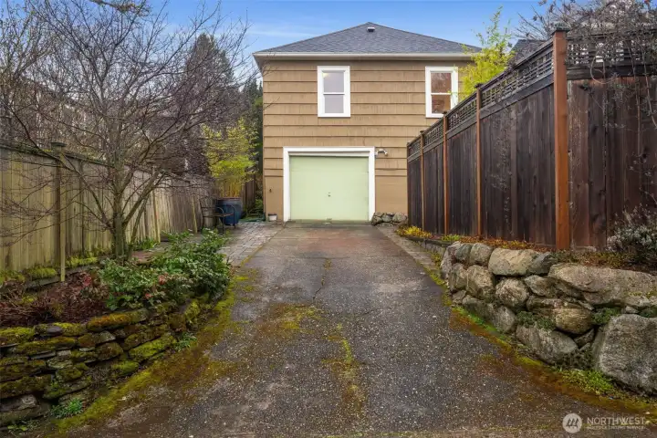 Garage access from private alley & plenty of driveway parking