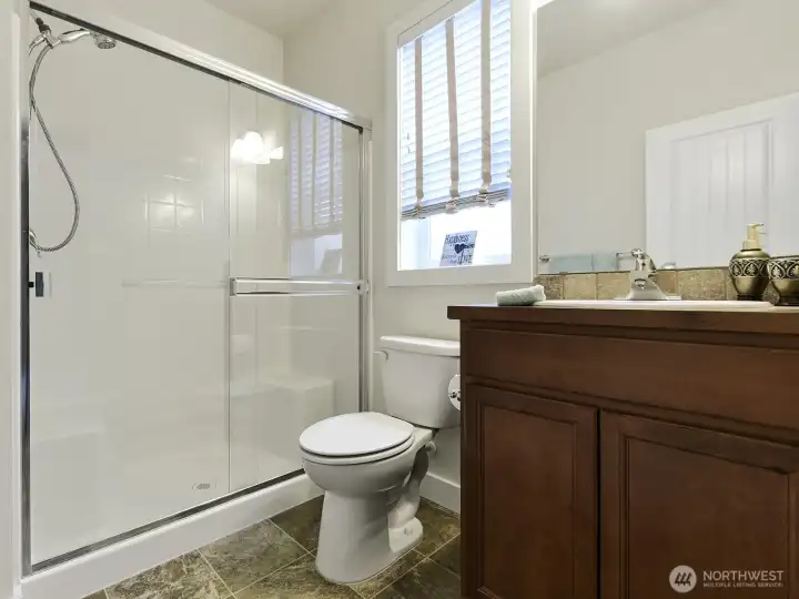 Primary bath w/ shower. Window too for extra light.