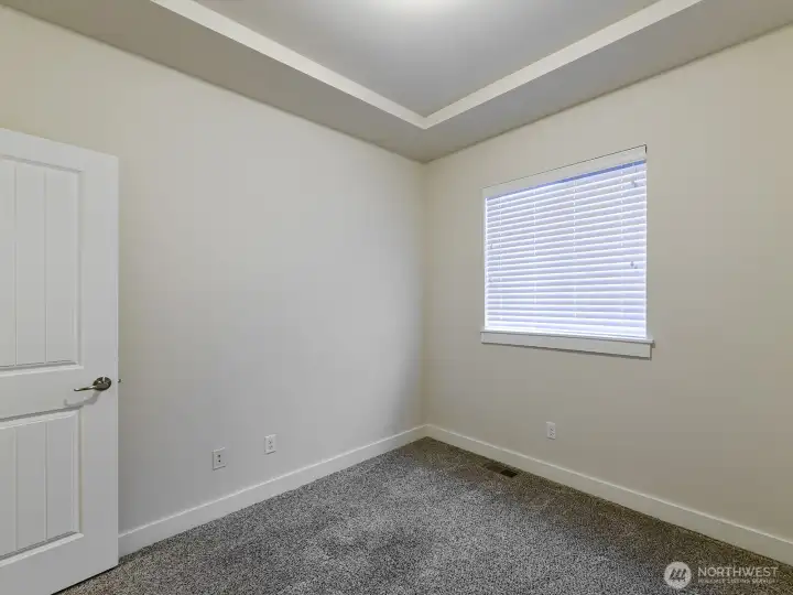 2nd bedroom has carpet.