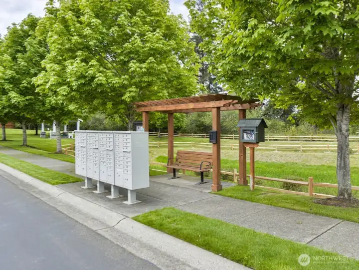 Mailboxes key and bench for relaxing.
