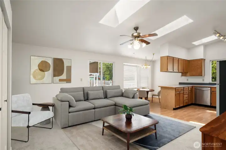 Virtually staged living area just off the kitchen