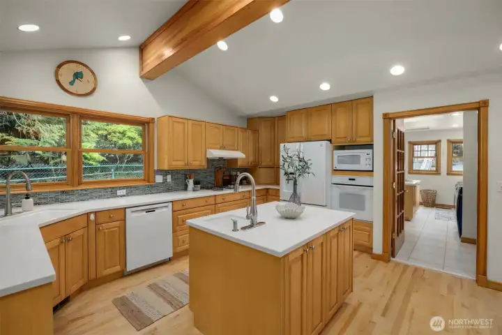 Spacious kitchen with island and breakfast bar Spacious kitchen with island and breakfast bar
