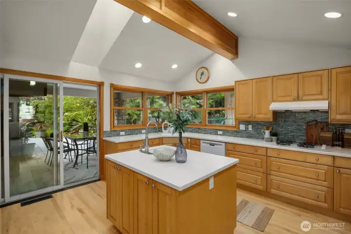 Spacious kitchen with island and breakfast bar Spacious kitchen with island and breakfast bar