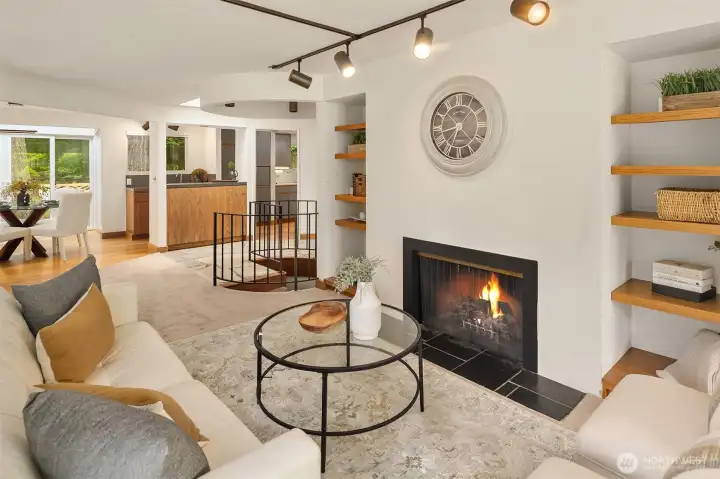 Living Room with fireplace and built-in shelves.