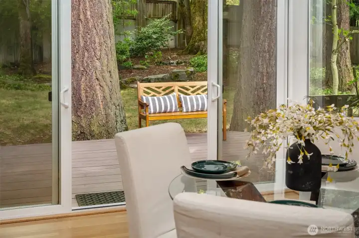 The large deck is ideal for enjoying the private back yard or entertaining in a scenic setting