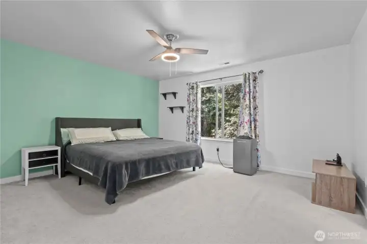 Primary Suite w/Ceiling Fan overlooking Greenbelt
