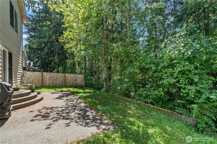 Amazingly private backyard w/Large Patio backing to community greenbelt.
