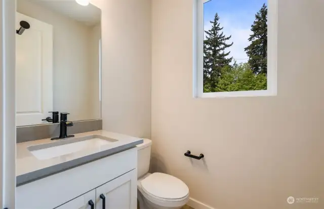 Powder bath on main level. All pictures are of a completed home of same plan. Finishes will vary