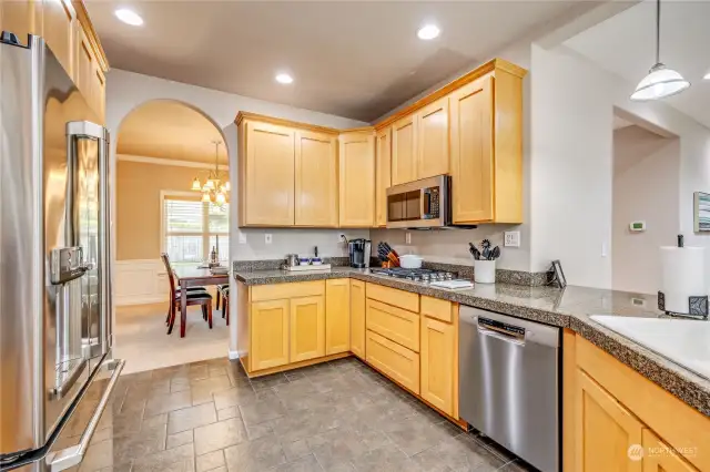 Spacious kitchen with lots of counter space and storage.