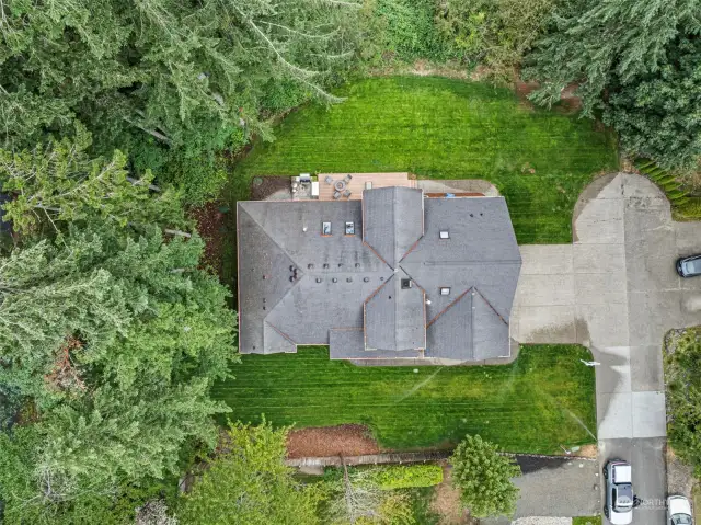 Drone view of home on lot.