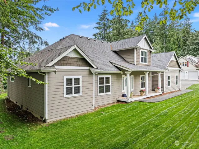 Front and side yard with freshly planted grass.