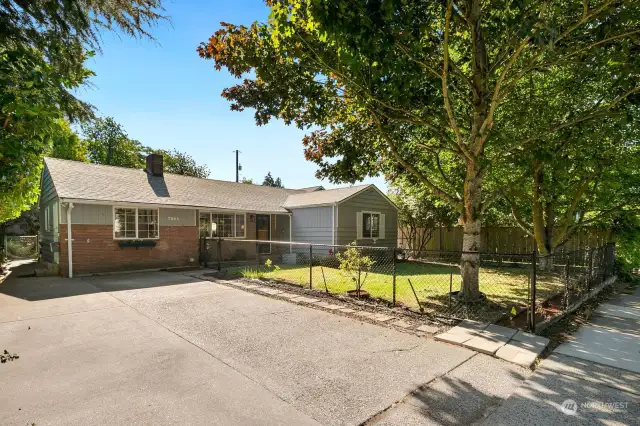 Great yard space, plenty of off-street parking & lots of mature growth for added privacy.