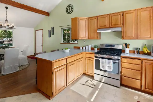 Vaulted ceiling here create a light & airy feel.