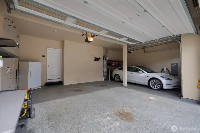 THREE GARAGE BAYS