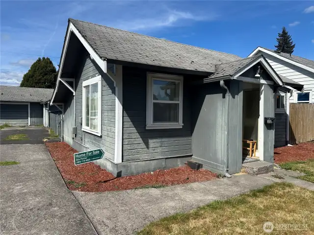 Welcome Home! Separate Detached Garage! With fenced in back yard.