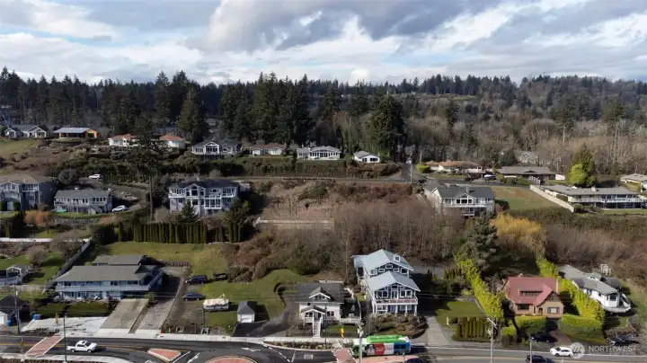Drone shot looking west to building lot before construction.