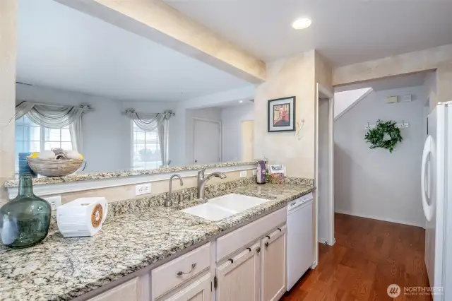 Kitchen opens to the living & dining rooms