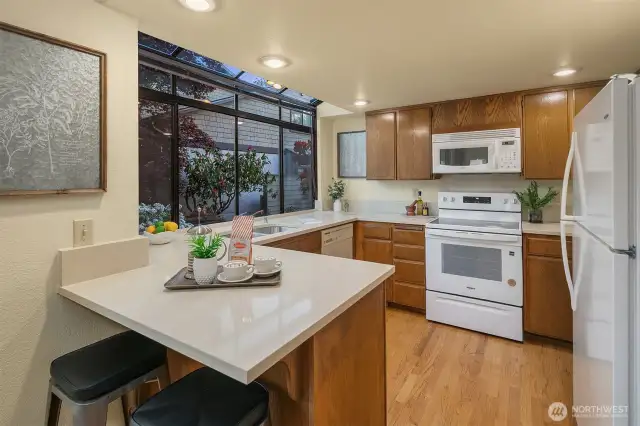 Brand new quartz countertop, Brand new stove/range, and newer appliances.