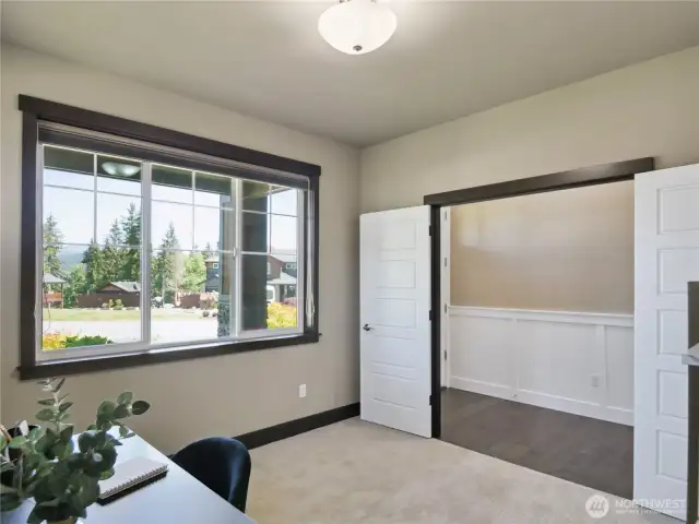 Office or study with lots of windows and blinds that are adjustable. Work from home or have plenty of room to study.
