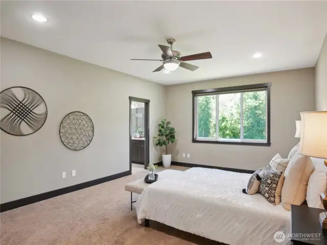Another view of the primary bedroom.