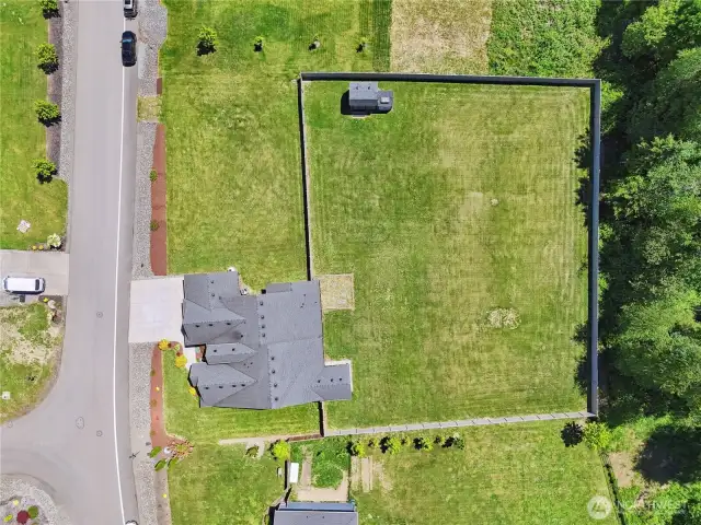 Look at that back yard. Perfect for games, animals, or gardening without worrying about deer.