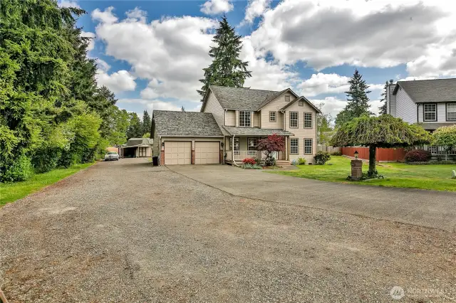 Welcome home! Nestled at the end of a cul-de-sac, this home is special with all of the space it has to offer for parking, gatherings and all of your toys!
