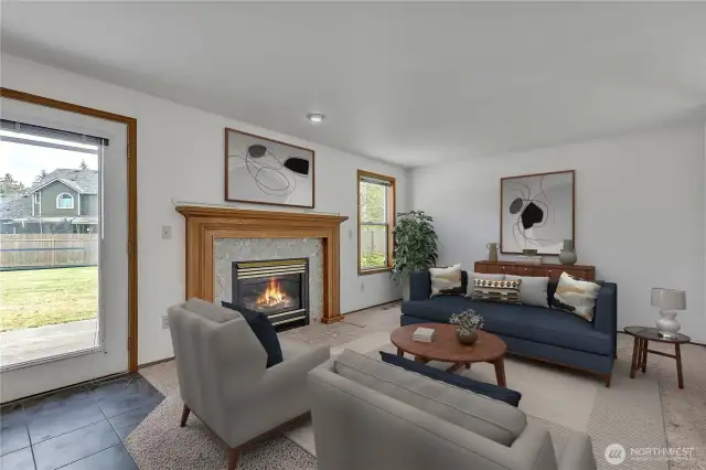 The family room features a cozy gas fireplace that not only adds warmth but also creates a wonderful ambiance.