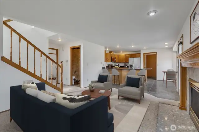 There is a powder room (half bathroom) on the left side tucked away from the living space but very convient.
