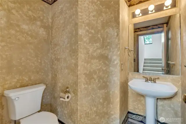 Here's a closer view of the powder room with a pedestal sink.