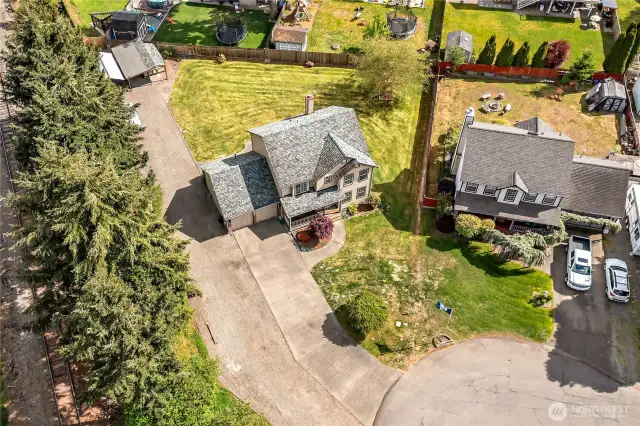 This picture effectively showcases the space and privacy available with this home. It is rare in a housing development.