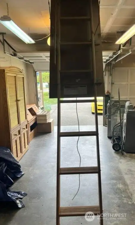In addition to the storage available in the home, there is an added bonus with the pull-down stairs and full attic storage as well.