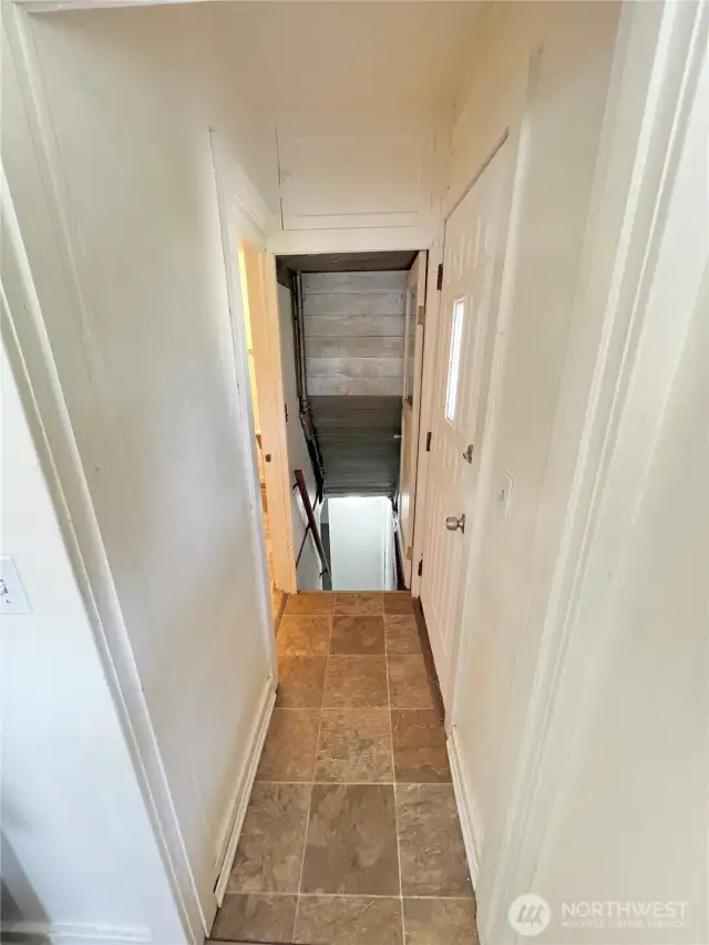 Upstairs hallway,off of kitchen and bathroom leading to Basement