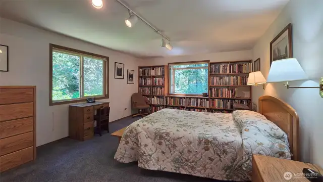 Primary Bedroom with built in bookcase
