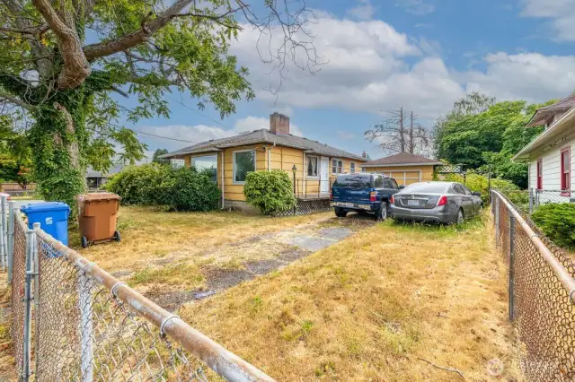 Large, fully fenced Corner lot with free standing garage.