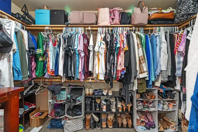 1st walk in closet for primary bedroom