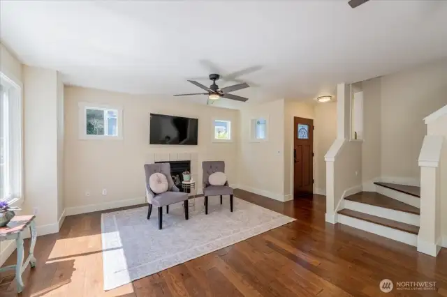 View of Front Room and Hardwood flooring stairs to the upper floor